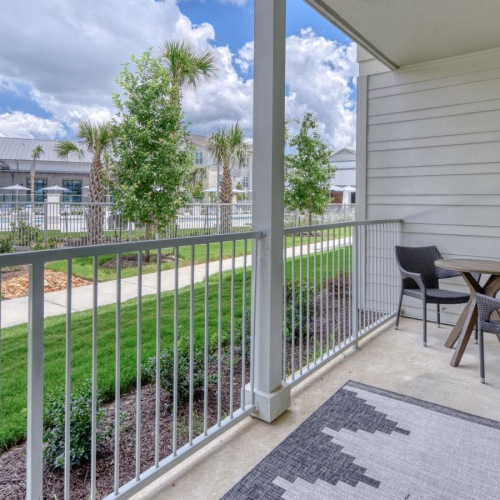 private patio with a table and chairs