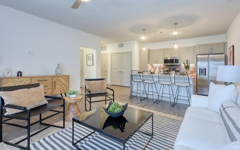 spacious living room open to kitchen